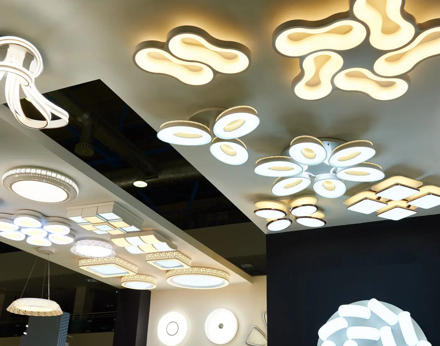 Ceiling lights in modern geometric designs.