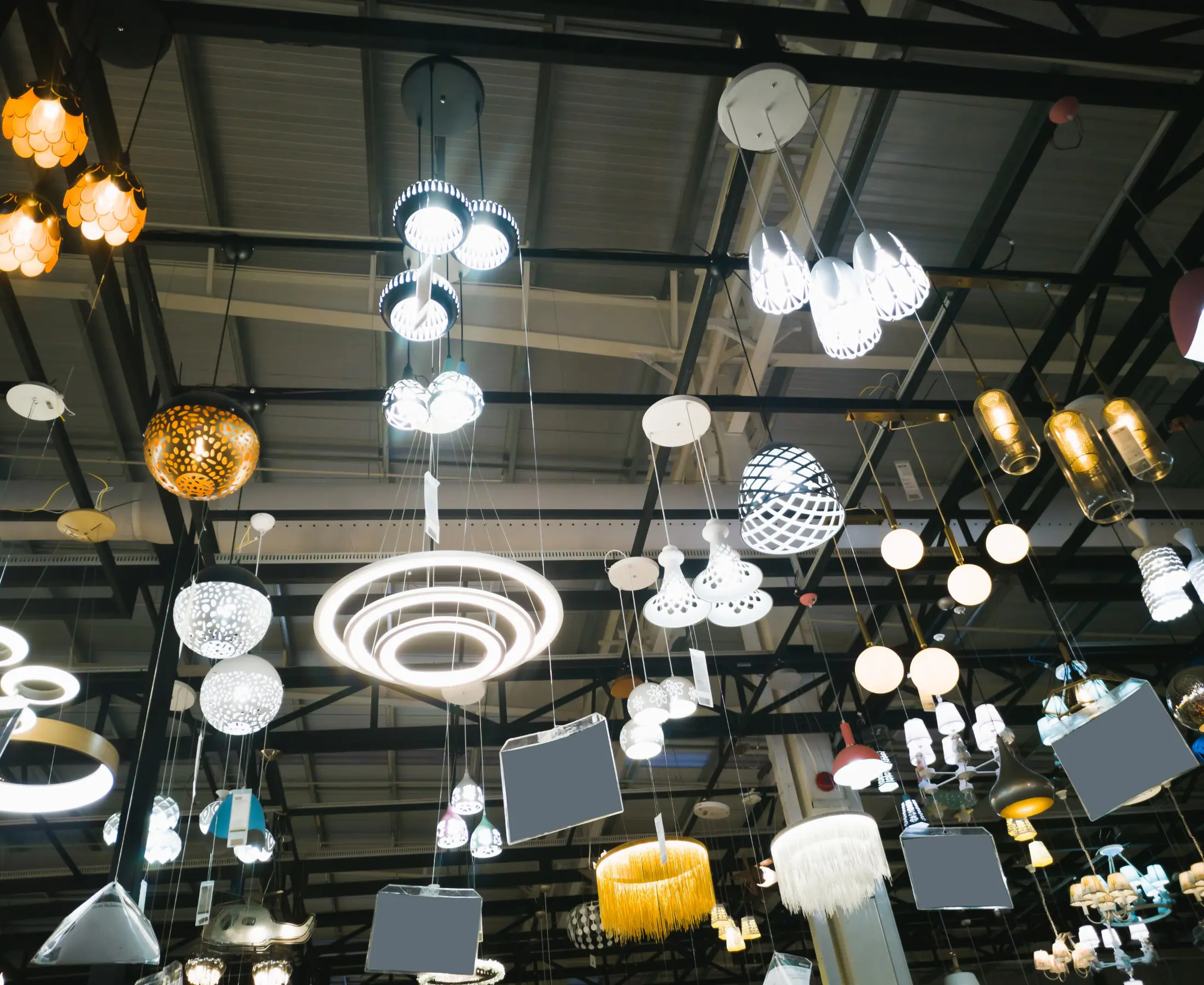 Various ceiling lamps displayed in a store.