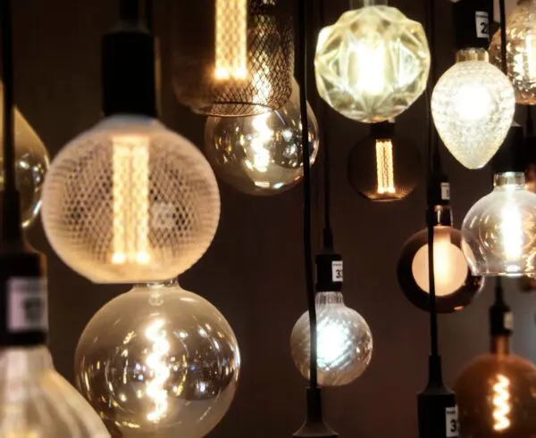 Hanging decorative light bulbs in various shapes.