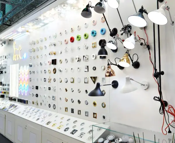 Lighting fixtures and switches display in store.